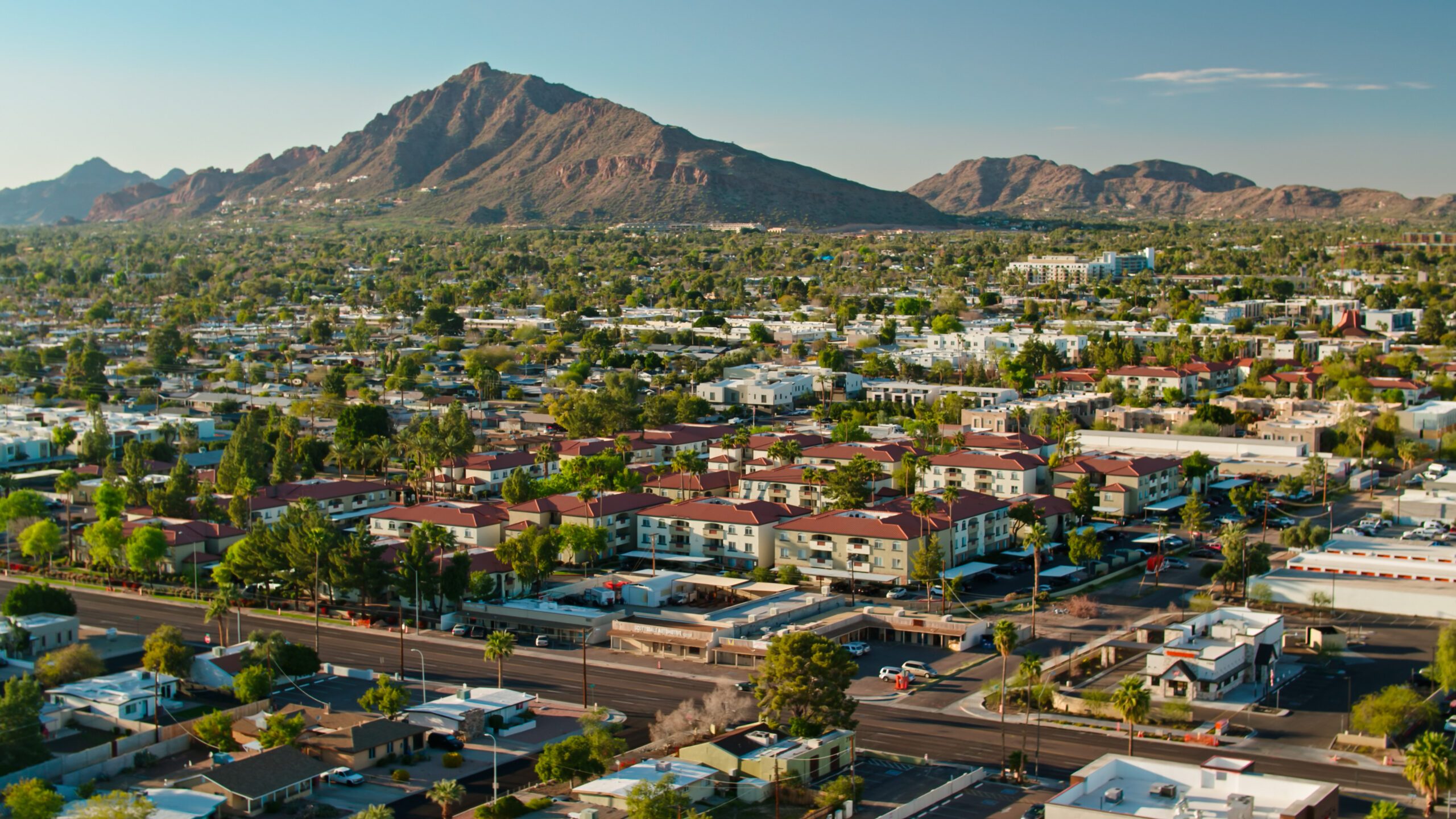 Aerial view of Scottsdale, Arizona with a mountain in the background