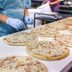 Here's Why Your Costco Pizza Slice Has Holes in It