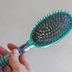 Here's What the Gray Fuzz Is on Your Hairbrush—It's Grosser Than You Think